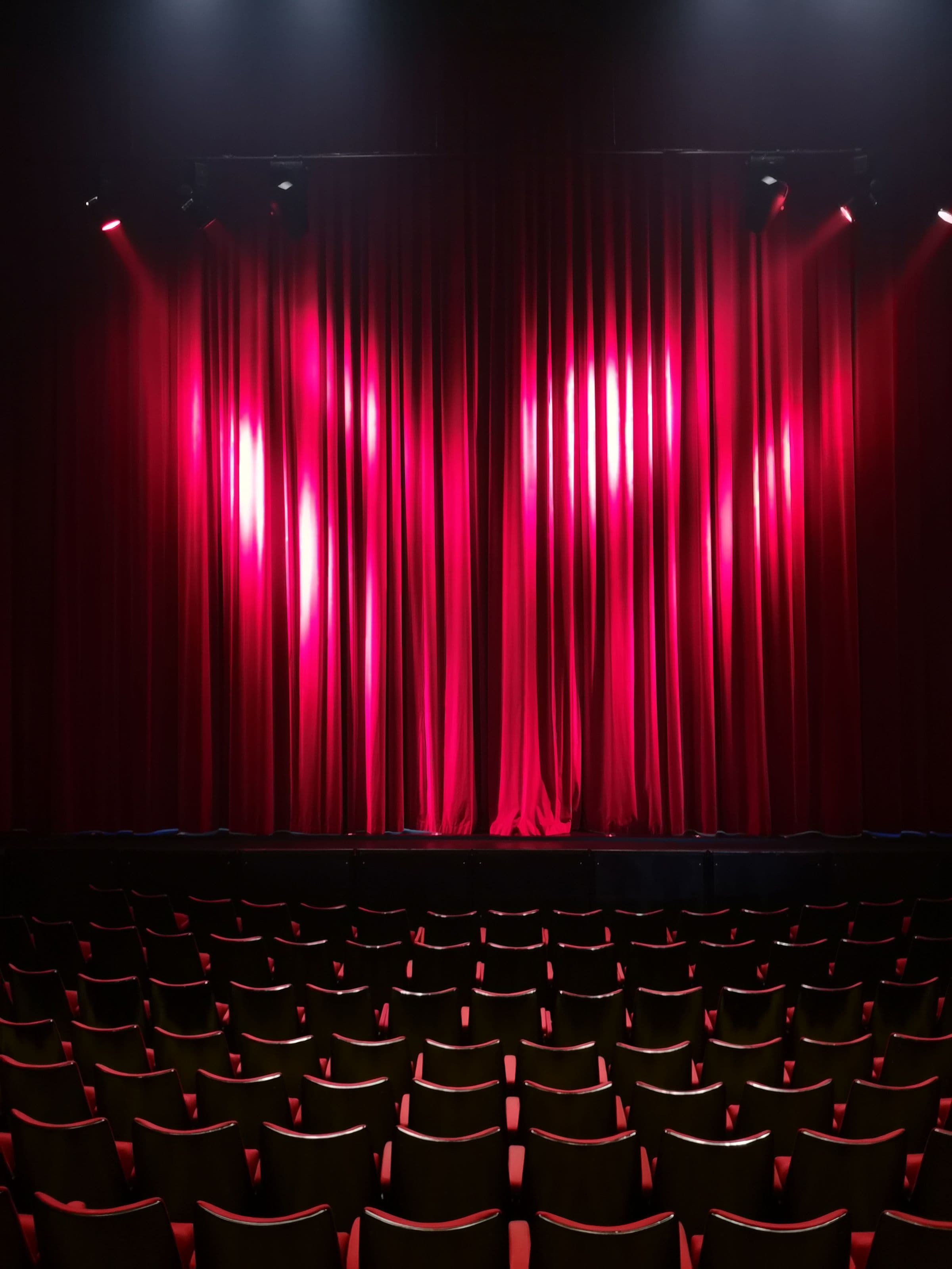 A red theatre curtain before a show